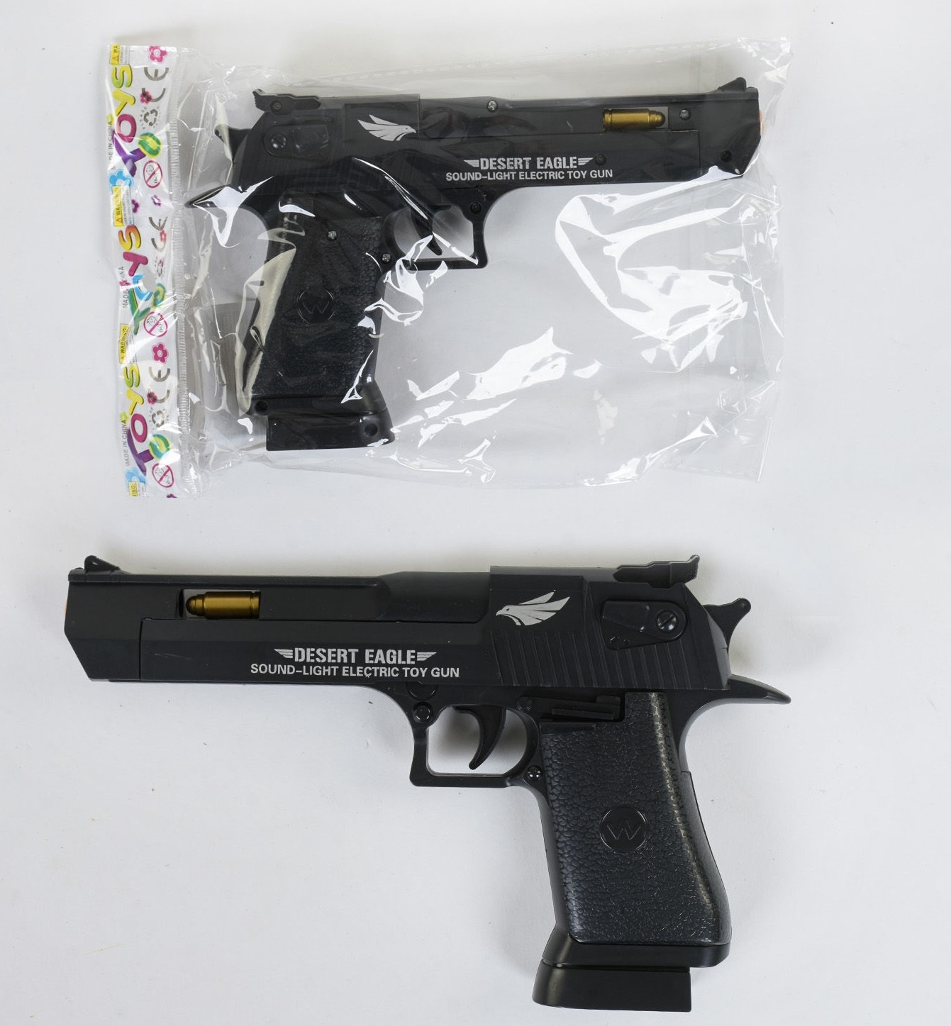 Пістолет музичний 8180-32 А світлові ефекти, на батарейках, в пакеті